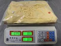 Yellow pleated tube dress on a digital scale showing weight of 390 grams - XS / Dresses / Yellow