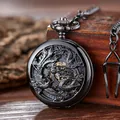 Montre à gousset mécanique vintage avec gravure détaillée de dragon et phénix en noir - Dragon Noir Manuel