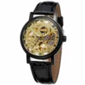 Detailed view of WINNER men's mechanical skeleton watch with gold gears and leather strap - Men Gold Dial Black Case Black Strap