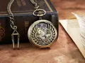 Montre à gousset mécanique rétro en bronze avec motif d'aile évidée et chaîne - Ouverture simple / Marron