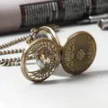 Montre à gousset mécanique vintage avec couvercle ajouré, finition bronze antique et chaîne - Double ouverture / Marron