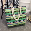Bohemian ethnic canvas tote bag with thick rope handles and vibrant green patterns. - Ethnic Green