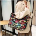 Large ethnic style canvas tote bag featuring colorful leaf print and sturdy rope handles - Large Floral
