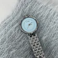 Montre CILOA élégante pour femme avec cadran bleu clair et bracelet en acier argenté - Cadran Bleu Clair Rond Bracelet en Acier Argenté / Bleu