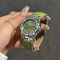 Elegante CILOA Damenuhr mit grünem Lederarmband und einer funkelnden Strass-Lünette - Grüner Ledergürtel