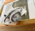 Elegante orologio da polso ovale in argento da donna con numeri romani e lancette blu - Stile Ovale Semplice / Argento Bianco