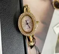 Elegante orologio da polso a quarzo dorato da donna con lunetta in cristallo lucido. - Stile Ghiera con Strass Ovale / Stile Oro Bianco con Strass