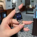 Elegant women's watch with rectangular blue dial and silver link bracelet - Blue