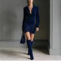 Detailed view of navy blue suede wrap dress with stylish fringe hemline - XS / Dresses / Dark Blue