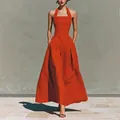 Elegante abito lungo rosso-arancio allacciato al collo con tasche in finto lino. - Taglia S / Vestiti / arancio-rosso