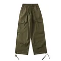 Modische olivgrüne Vintage-Cargohose mit weitem Bein und seitlichen Pattentaschen. - S / Unterteile / Armeegrün