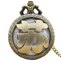 Vintage bronze pocket watch featuring the Chinese family name 'Su' in embossed relief. - Su Surname Style