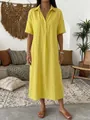 Casual yellow linen short sleeve polo collar dress for women in a lifestyle setting - S / Dresses / Yellow
