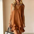 Chic brown V-neck sleeveless dress with elegant flounce hem and relaxed fit styling. - Brown