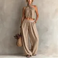 Elegante conjunto bohemio de dos piezas en lino con top halter y pantalones anchos - XS / Top y Pantalones / Caqui