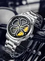 Macro view showing the unique rotatable car wheel hub dial on this men's steel band watch. - Yellow