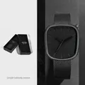 Minimalist all-black pebble shaped quartz watch with stainless steel mesh strap and box - Silver Mesh Black Dial