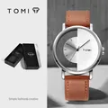 TOMI minimalist hollow design watch with brown leather strap and silver dial for unisex wear - T080-4 / Silver Case Light Brown Strap