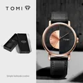 Minimalistische TOMI Unisex-Uhr mit einzigartigem hohlen Zifferblatt und schwarzem Band. - Roségoldgehäuse Schwarzes Armband
