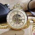 Vintage gold mechanical pocket watch with hollow skeleton Roman numeral dial and chain - Gold