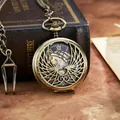 Montre à gousset mécanique vintage en bronze avec design ailes ajourées et chiffres - Bronze Antique