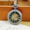 Vintage bronze skeleton mechanical pocket watch with Roman numerals and elegant chain - Bronze