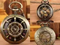 Montre à gousset mécanique vintage en bronze avec squelette creux et chiffres romains - Cadran Roue Or Rose