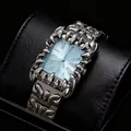Montre à quartz Millennial Y2K avec lunette griffe argentée et cadran bleu clair - Boîtier Noir Bleu