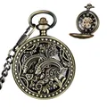 Montre à gousset mécanique en bronze vintage avec motif dauphin ajouré et chiffres romains - Style Évidé Dauphin Fleurs (4) / Boîtier Bronze Cadran Noir