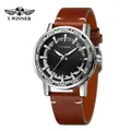 Close-up of T-WINNER men's manual mechanical watch with skeleton dial and brown leather strap - Silver Case Black Dial