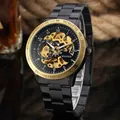 Detailed close-up of a T-WINNER automatic skeleton mechanical watch with gold-tone gears. - Black Steel Band Black Ring Skeleton Dial (112)