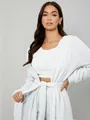 Front view of a model wearing a soft white plush 3-piece loungewear set with belt - S / Top And Bottom / White