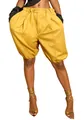 Close-up of vibrant yellow lantern shorts with pleated waist and elastic cuffs on white - S / Bottoms / Dark Yellow