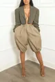 Close-up of stylish khaki lantern shorts paired with a fashionable olive green cropped blazer. - S / Bottoms / Khaki