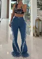 Dettaglio di jeans a zampa a vita alta con frange sfilacciate laterali alla moda - Taglia S / Pantaloni e gonne / Blu