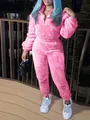 Détail d'un ensemble de détente rose pelucheux avec manches longues et pantalon - S / Haut Et Bas / Rose