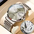 Reloj automático para hombre estilo mecánico con correa de acero inoxidable plata y fecha - Estilo Mecánico Hueco / Caja Plateada Esfera Gris - Correa de Acero