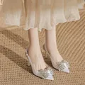 Elegant white pointed toe stiletto heels with sparkling rhinestone bow detail - 31 / 5cm Heel / White