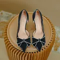 Elegant black pointed-toe stiletto pumps featuring a sparkle rhinestone bow detail - 31 / 5cm Heel / Black