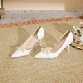 Elegant white pointed-toe stiletto pumps with decorative pearl strap and side hollow - 31 / 7.5CM White