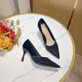 Elegant black glitter pointed-toe stiletto high heels with patent leather finish - 38 / Black