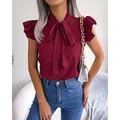 Elegant burgundy short sleeve blouse with bow tie neck and ruffled sleeves - S / Tops / Burgundy