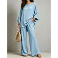 Elegant light blue cotton linen two-piece set featuring tunic top and wide-leg trousers - Light Blue