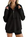 Detail view of the oversized black fleece quarter-zip sweatshirt showing collar and fit - S / Tops / Black