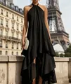 Elegante abito nero a trapezio con balze e orlo asimmetrico in una via di Parigi - Taglia S / Vestiti / Nero
