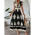 Elegante vestido maxi estampado en blanco y negro con cuello en V y cintura alta elástica - Vestidos / Negro / S