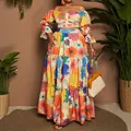 Vibrant floral print two-piece set with off-shoulder crop top and tiered maxi skirt. - M / Top And Bottom / Rainbow