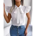 Elegant white short sleeve blouse featuring a tie-neck bow and ruffled sleeves for summer - S / Tops / White