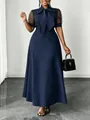 Detail of navy blue midi dress featuring mesh puff sleeves and an elegant bow neckline. - 3XL / Dresses / Dark Blue