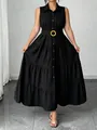 Elegante abito lungo senza maniche nero con colletto polo e cintura in vita abbinata. - Nero